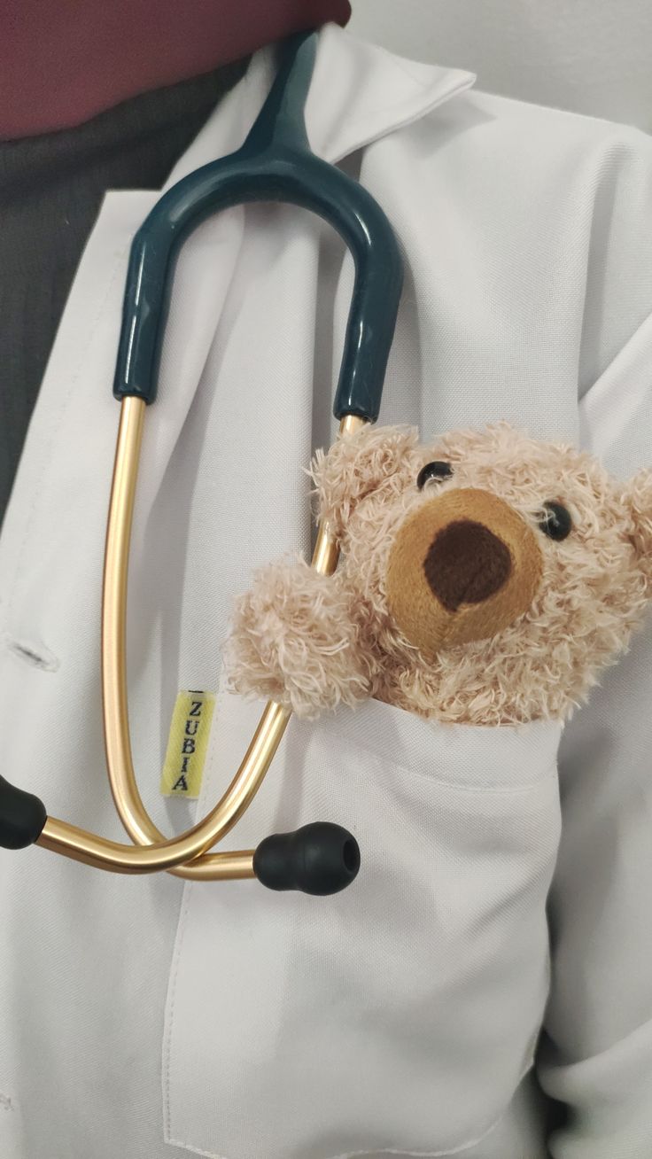 Teddy bear beside a pediatric stethoscope